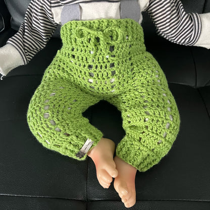 Apple crochet baby pants on baby