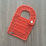 coral crochet baby bib