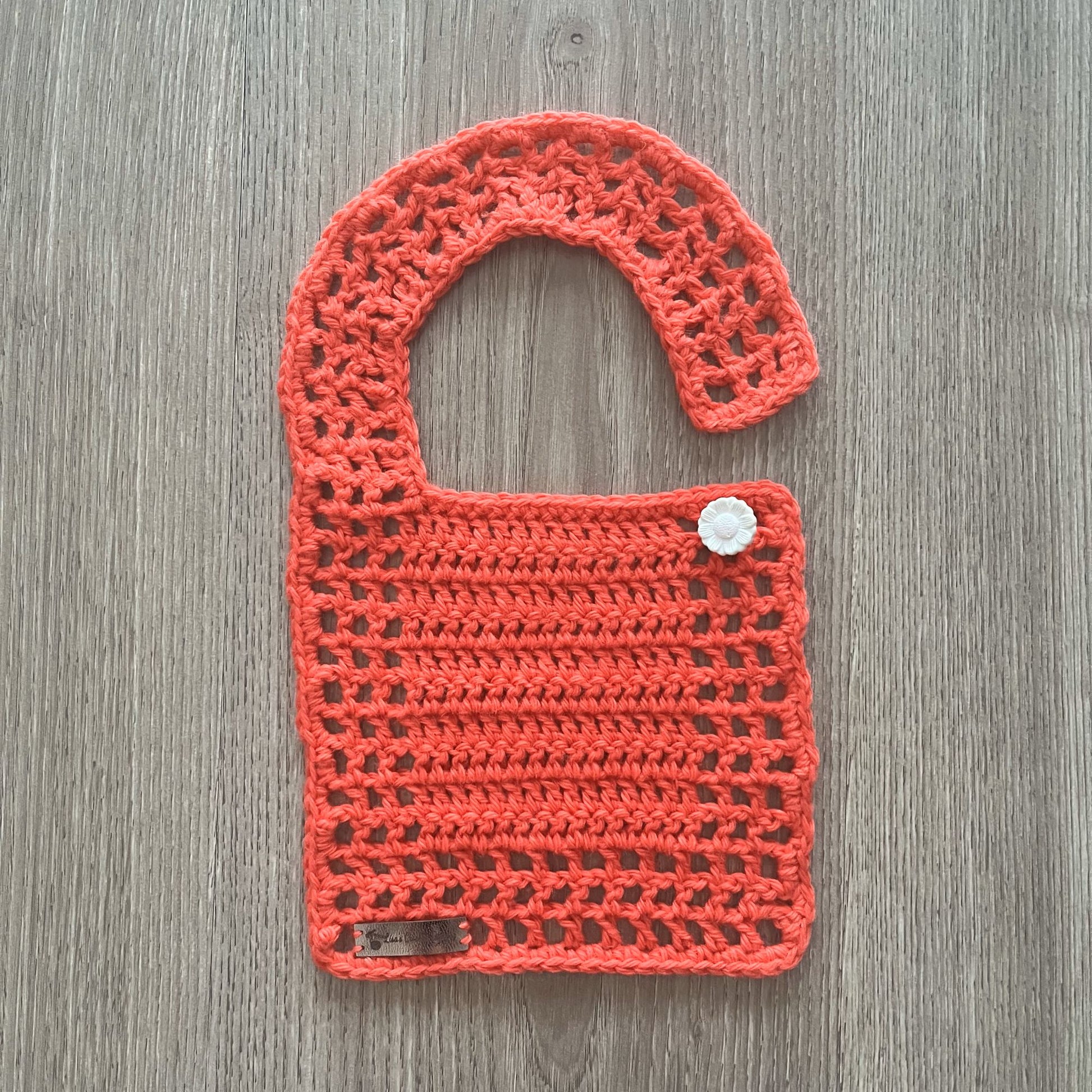 Coral Crochet Baby Bib open