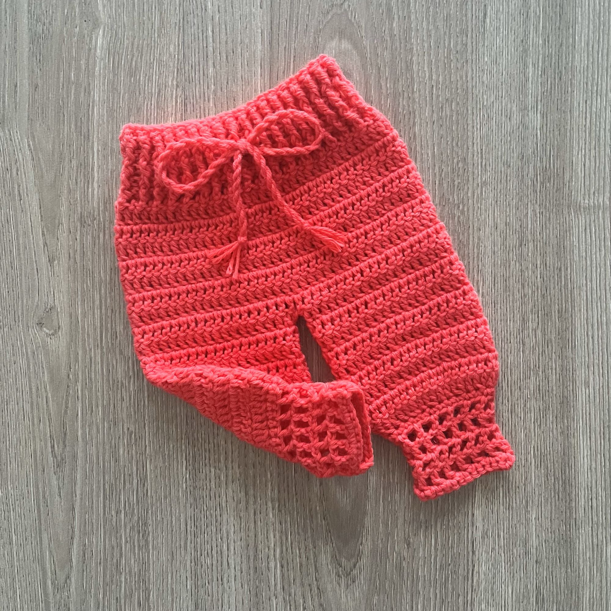 Coral Crochet Baby one leg kicking