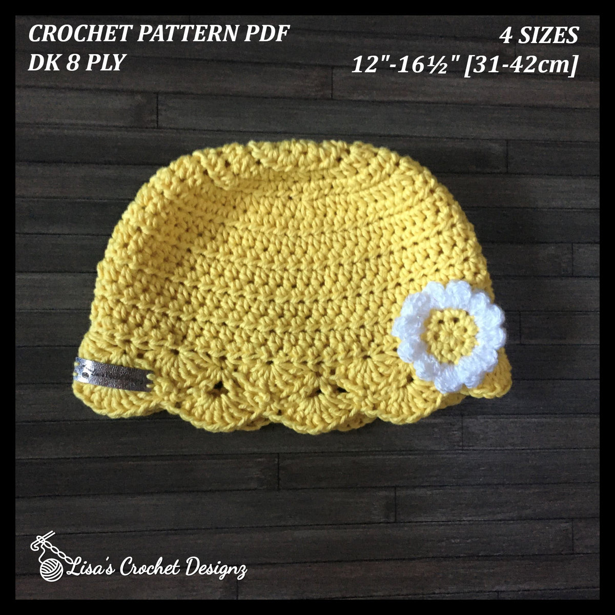 Daisy yellow crochet baby beanie with white flower flat lay on wood, sizes Prem–12M, digital pattern PDF