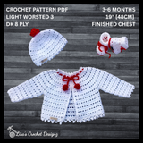 Holly Christmas crochet cardigan, hat and booties digital pattern PDF flat lay in white on wood with red pompoms.
