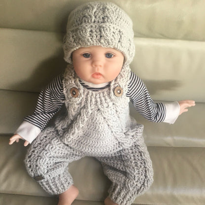 hugo baby romper and hat set on baby