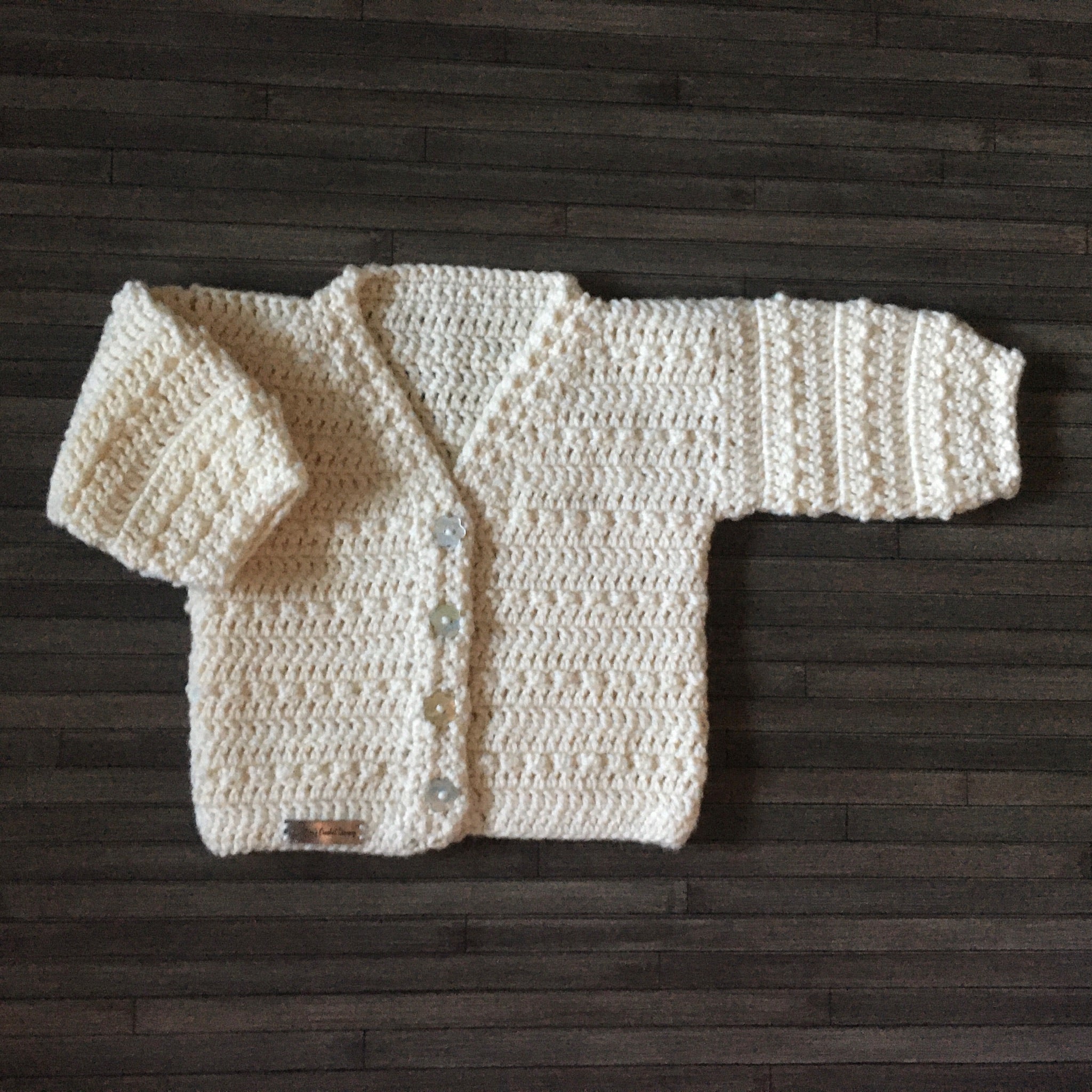 ashley crochet sweater one arm in