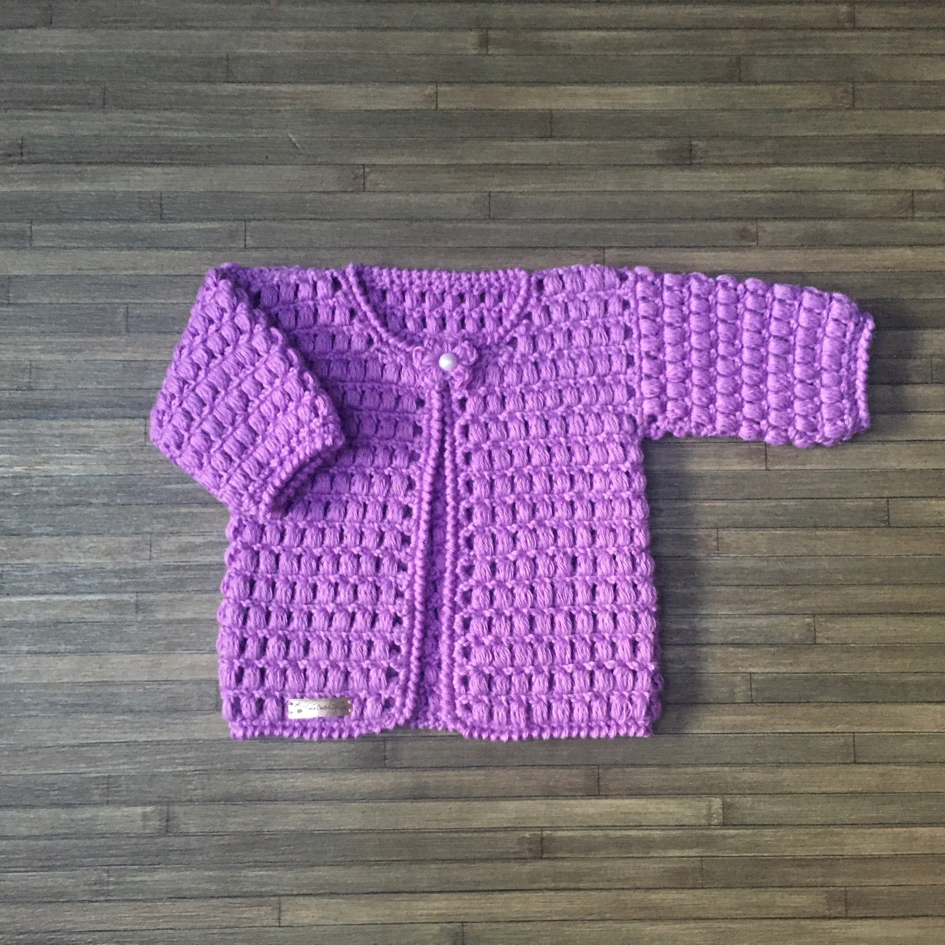 beth crochet baby sweater one arm in