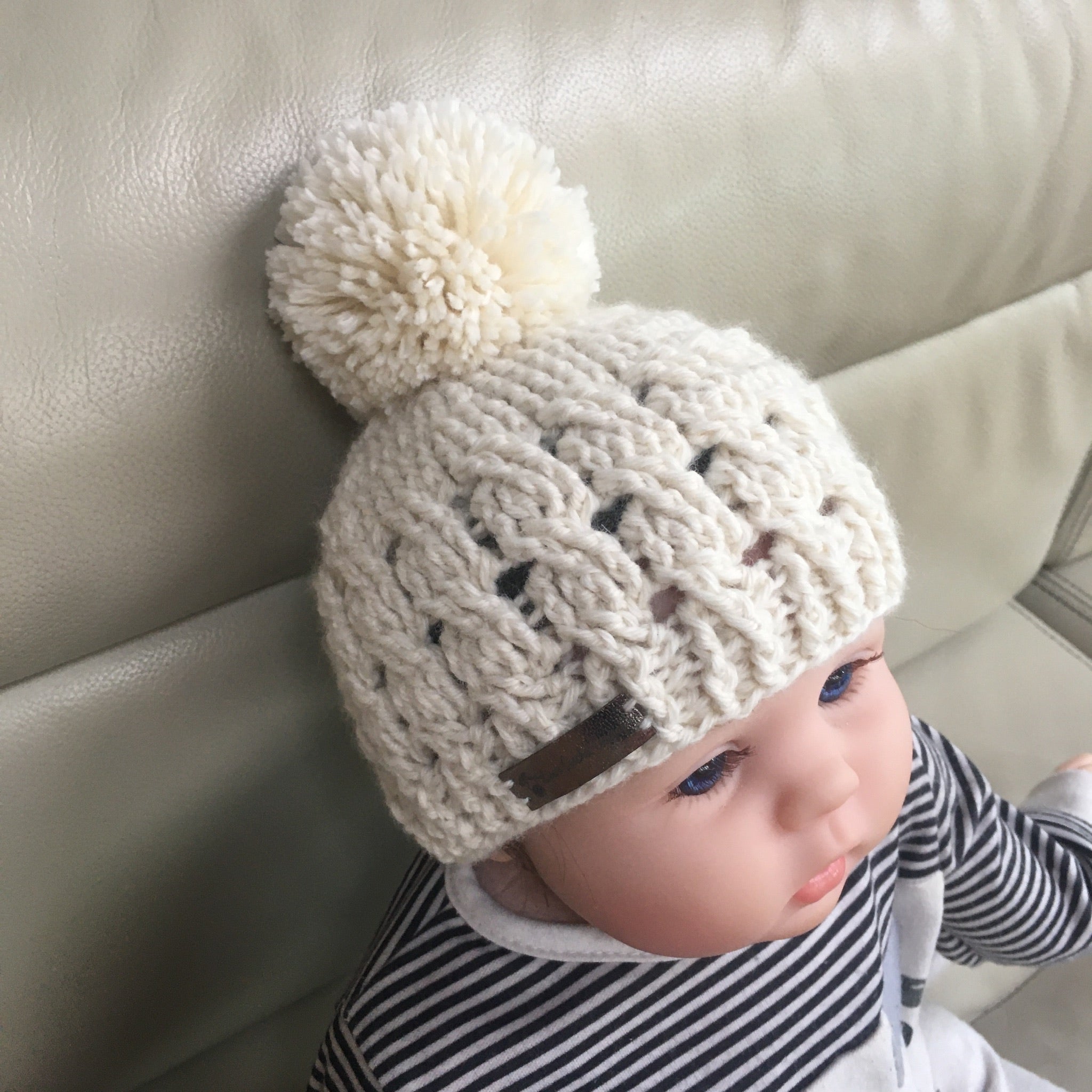 caleb crochet cabled hat on baby left side