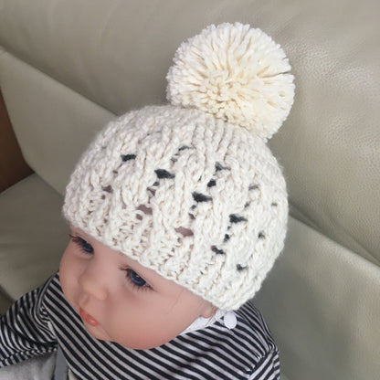 caleb crochet cabled hat on baby right side