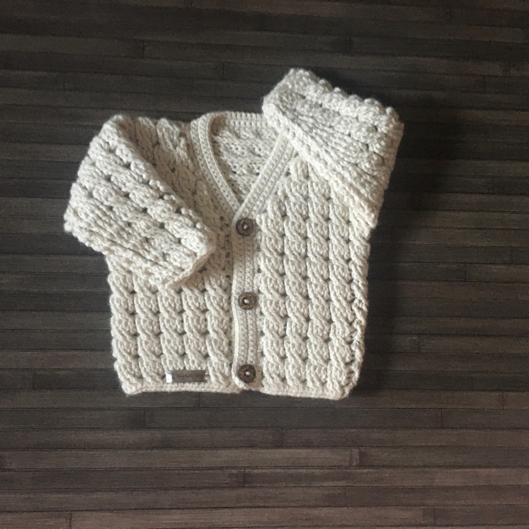 caleb crochet baby sweater one arm up one arm down