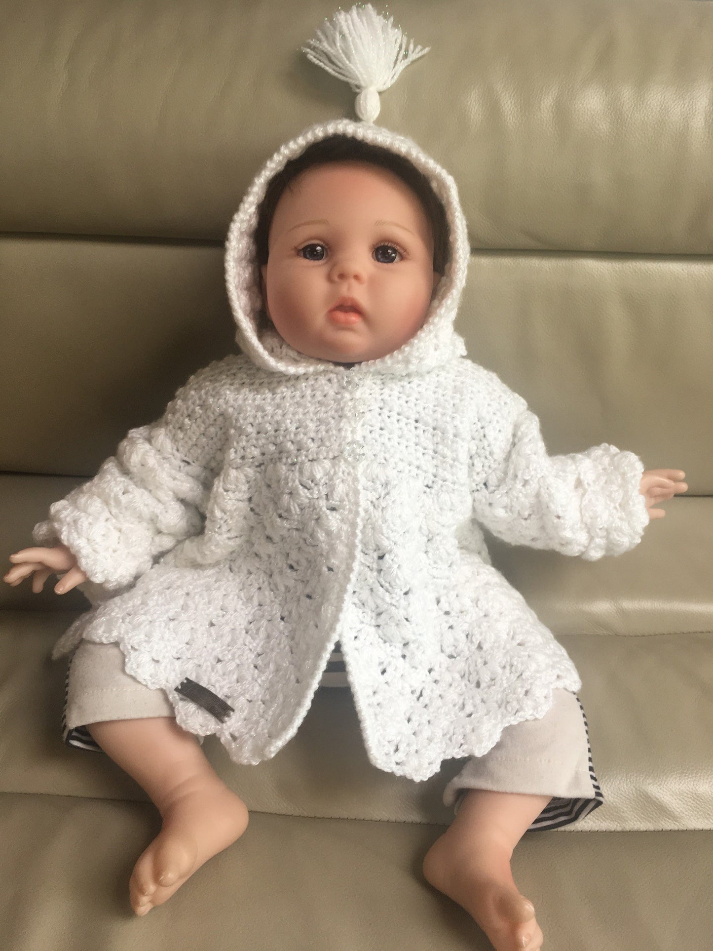 cherry crochet baby coat on baby